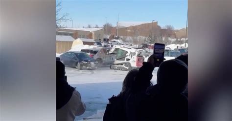 Video shows Nebraska man ramming skid loader into police car